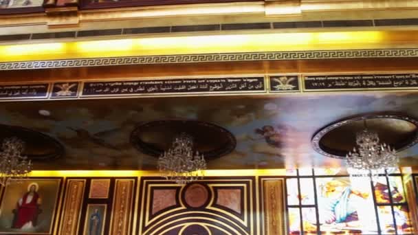 Sharm el-Sheikh, Egypt - November 30, 2016: View inside the Coptic Church beautiful painted walls and ceilings on religious themes — Stock Video