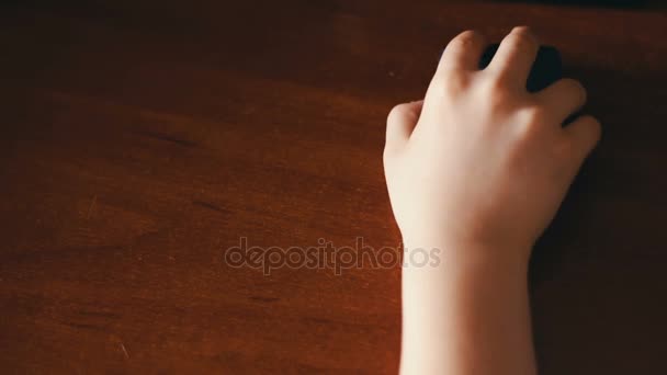 Closeup of teenager hand using a computer mouse — Stock Video