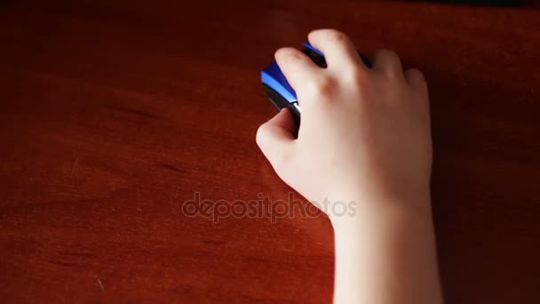 Closeup of teenager hand using a computer mouse — Stock Video