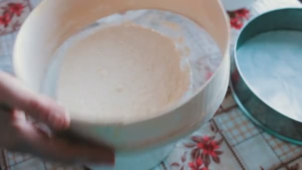 A woman sifts the flour through a sieve — Stock Video