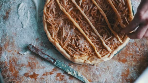 Sliced apples on cake batter in baking pan — Stock Video