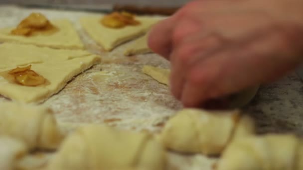 Woman working with dough. making homemade croissants — Stock Video