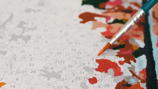 Maler Malerei mit Acrylfarben. Färbung Bild nach Zahlen