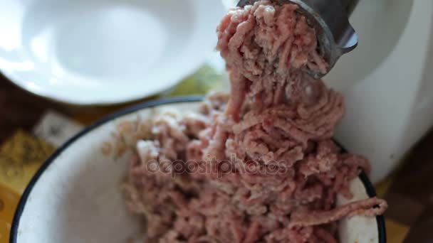 Electric meat grinder grinds meat for minced meat close up view — Stock Video