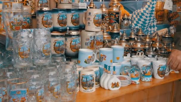 September 17, 2017 - Oktoberfest, Munich, Germany:Large number of various souvenir glass and porcelain beer mugs. World Beer Festival in Bavaria — Stock Video