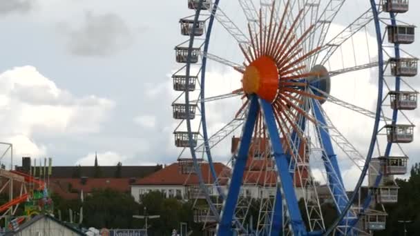 September 17, 2017 - Oktoberfest, Munich, Germany: Attraction is a ferris wheel on which lot of people ride. World Beer Festival and its entertainment — Stock Video