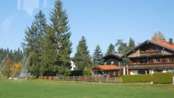 View from the train window on typical Bavarian villages and houses — Stock Video