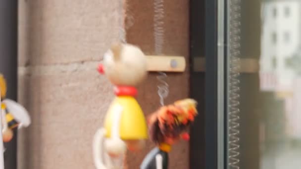 Funny wooden toys string puppet moving around that jump on street of Nuremberg, Germany — Stock Video