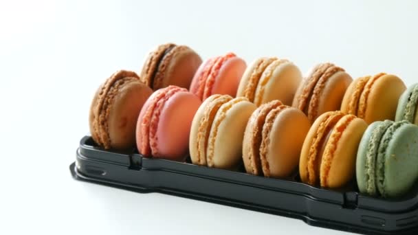 Multicolored macaron or macaroon on a white table — 비디오