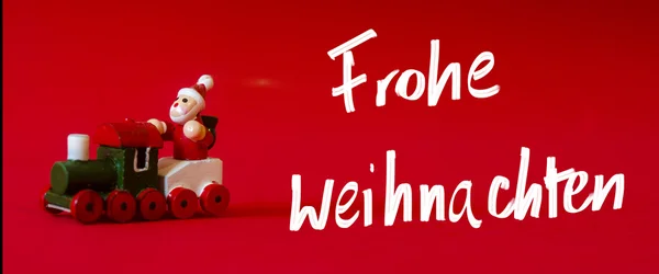 Γερμανική Χριστουγεννιάτικη διακόσμηση. Χειρόγραφες προσδοκιές στα Γερμανικά «ευχόμαστε καλά Χριστούγεννα" — Φωτογραφία Αρχείου