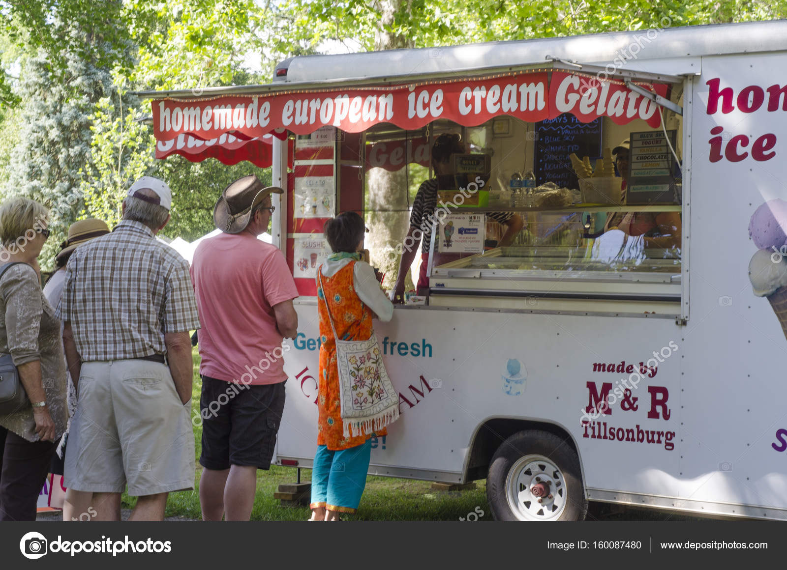Unidentified People Waiting In Line To Buy Ice Cream At The