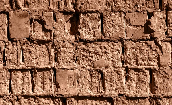 Κόκκινη αμμώδης πέτρινο τοίχο λεπτομερείς υφή φόντου — Φωτογραφία Αρχείου