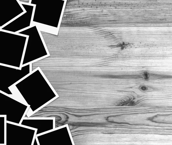 Paquete de marcos de fotos en madera ceniza parquet fondo blanco y negro — Foto de Stock