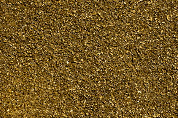 Gold ziemi i żwir makro tekstura tło — Zdjęcie stockowe