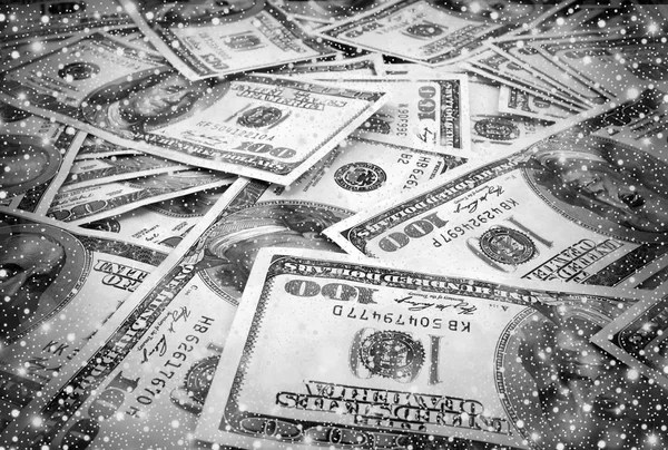 Mount of hundred dollar banknotes with shiny snowfall black and white — Stock Photo, Image