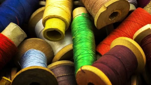 Colored high contrasted threads for sewing intro motion background — Stock Video