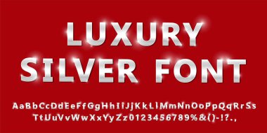 Siyah üzerine izole edilmiş parlak, modern gümüş yazı tipi