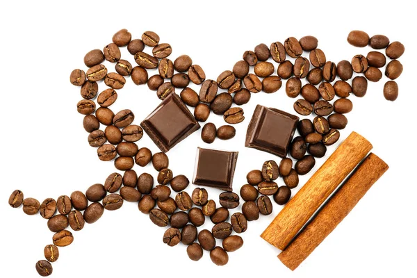 Roasted coffee beans in shape of heart with cupid arrow, chocolate cubes, cinnamon stick, isolated on white, top view. — Stock Photo, Image