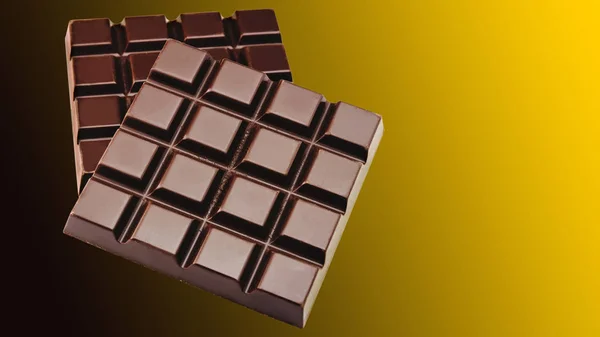 Two Dark Bitter Chocolate Bar Golden Gradient Background — 스톡 사진
