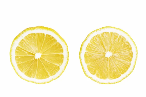 黄色熟したレモン フルーツ 白い背景で隔離の つの丸いスライス トップ ビュー — ストック写真