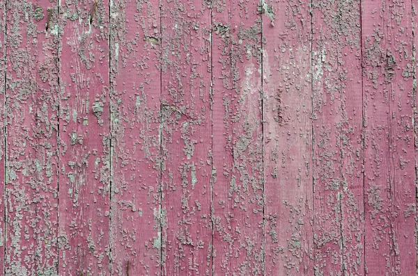 Pink rough boards located vertically. — Stock Photo, Image