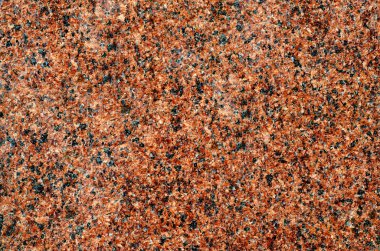 Parçalı yapı ile kahverengi-siyah granit plaka