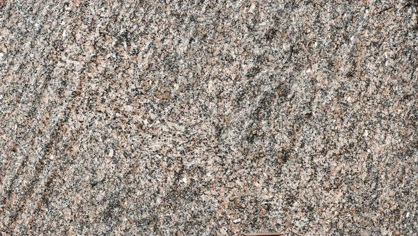 Tło uniform różowo szary grubej krystalicznego granitu — Zdjęcie stockowe