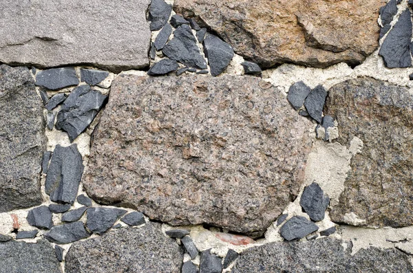 Estrutura de pedra de grandes fragmentos de granito close-up . — Fotografia de Stock