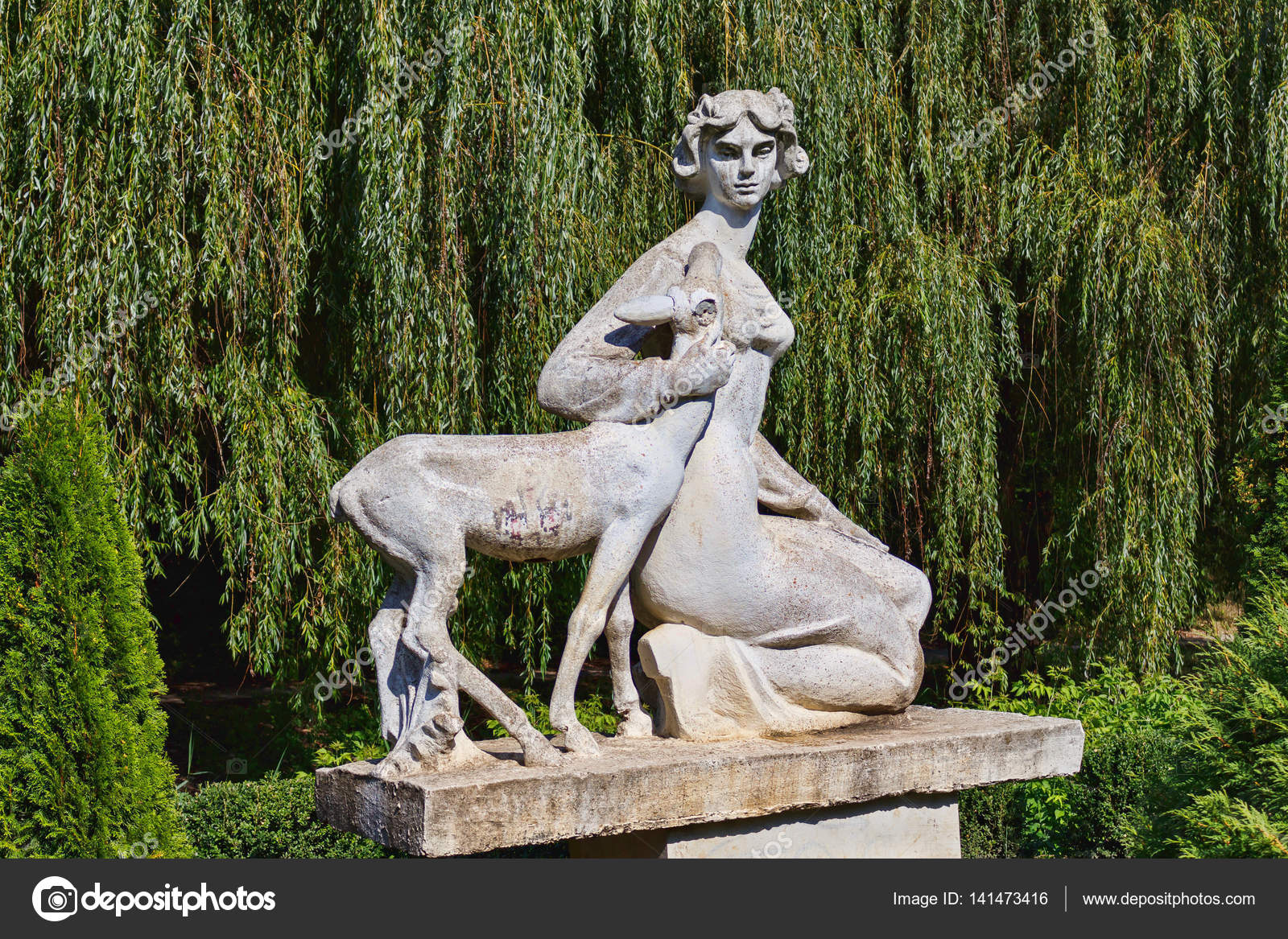 Women old statue in central park in city Stock Photo by