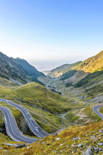 Daylight landscape view from top to winding road