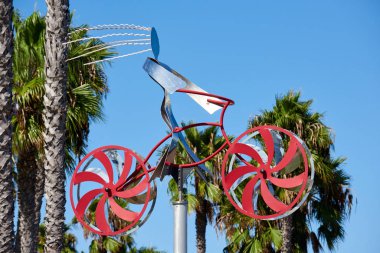SAN DIEGO, CALIFORNIA - SEPTEMBER 30, 2019: Amos Robinson kinetic bike sculpture made from metal