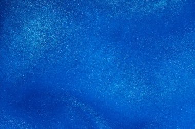 Mavi soyut arka plan. Beyaz kristalli parlak mavi boya. Güzel arkaplan.