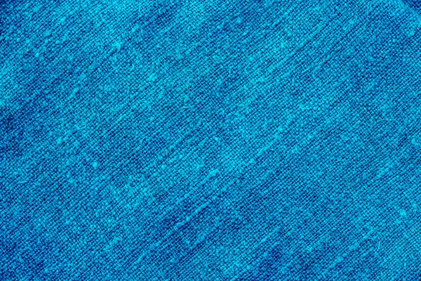 Blue linen background closeup. Macro. Old grungy fabric. Ancient texture. Denim material. — Stock fotografie
