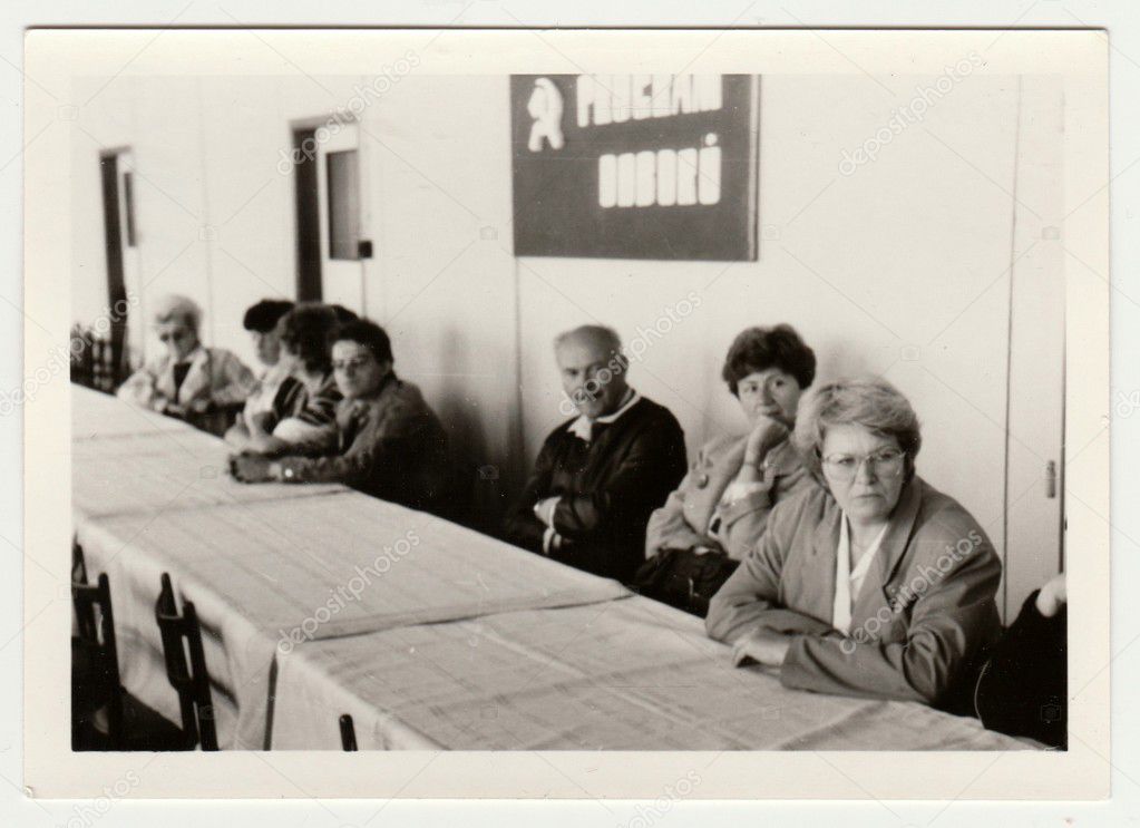  Vintage photo shows people at the communist meeting. Retro black & white  photography.