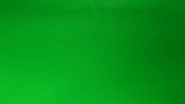 Açık yeşil sıvı renkli baloncuklar ile. Arka plan