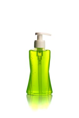 Bir şişe sıvı sabun, krem ya da yüz yıkama makinesi ya da beyaz arka planda izole edilmiş sıvı durdurucu..