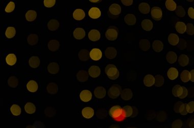 Soyut Işık Bokeh Arkaplanı. Odaklanmamış ışık noktaları soyut arkaplan.