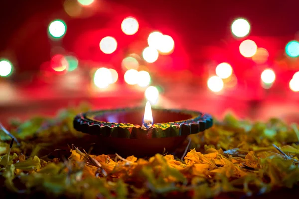 Happy Diwali - Clay Diya lamps lit during Diwali celebration. Greetings Card Design of Indian Hindu Light Festival called Diwali — Stock Photo, Image