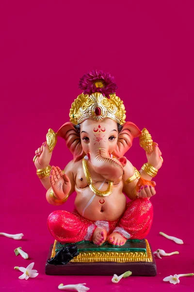 Hinduistischer Gott ganesha. ganesha idol auf rosa Hintergrund. — Stockfoto