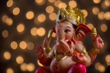 Hindu Tanrısı Ganesha 'nın Blured Bokeh arka planı, Ganesha Idol.