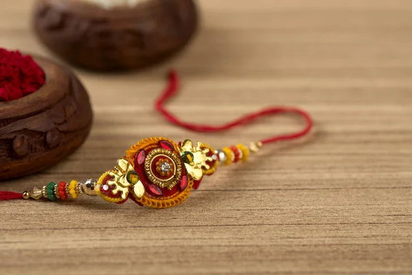 Festival Indiano Raksha Bandhan Fundo Com Elegante Rakhi Grãos Arroz — Fotografia de Stock