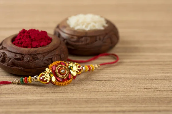 Індійський Фестиваль Raksha Bandhan Тло Елегантним Rakhi Rice Grains Kumkum — стокове фото