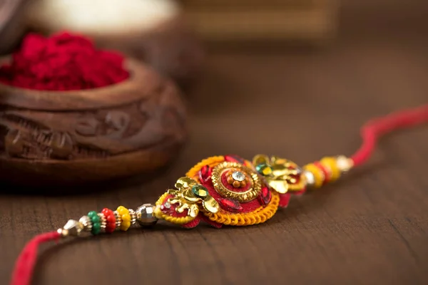 Festa Indiana Sfondo Raksha Bandhan Con Elegante Rakhi Rice Grains — Foto Stock