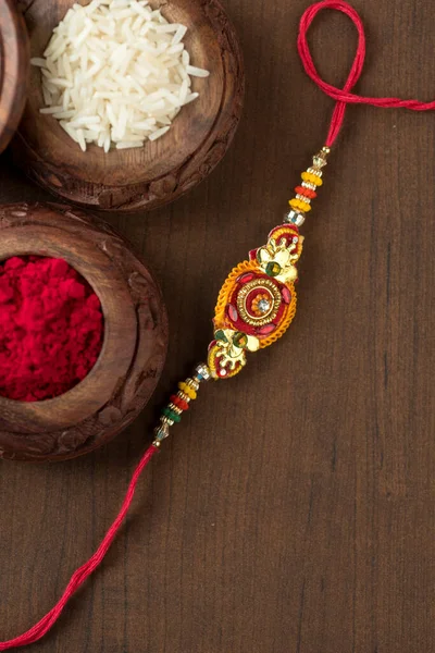 Індійський Фестиваль Raksha Bandhan Тло Елегантним Rakhi Rice Grains Kumkum — стокове фото