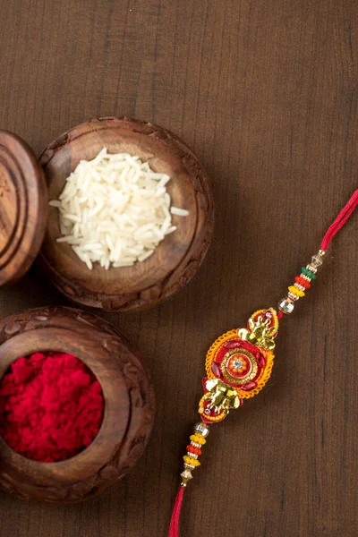 Індійський Фестиваль Raksha Bandhan Тло Елегантним Rakhi Rice Grains Kumkum — стокове фото