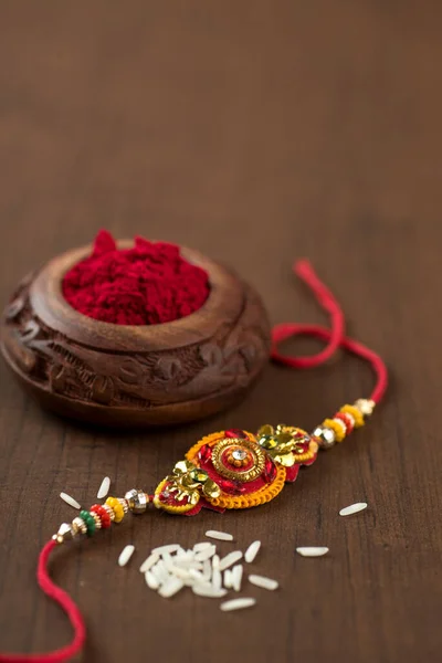 Festival Indiano Raksha Bandhan Fundo Com Elegante Rakhi Grãos Arroz — Fotografia de Stock