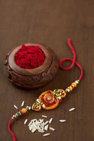 Festa Indiana Sfondo Raksha Bandhan Con Elegante Rakhi Rice Grains — Foto Stock