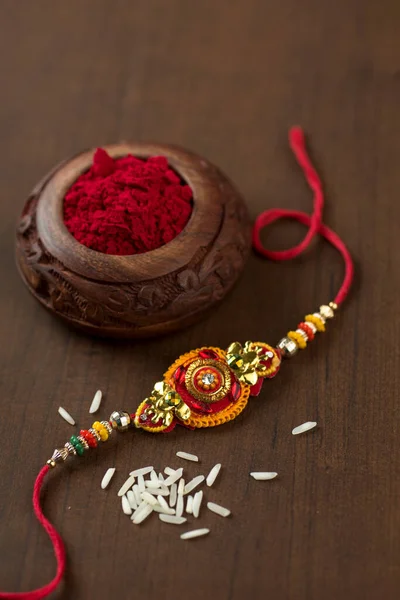 Індійський Фестиваль Raksha Bandhan Тло Елегантним Rakhi Rice Grains Kumkum — стокове фото