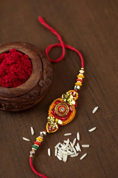 Індійський Фестиваль Raksha Bandhan Тло Елегантним Rakhi Rice Grains Kumkum — стокове фото