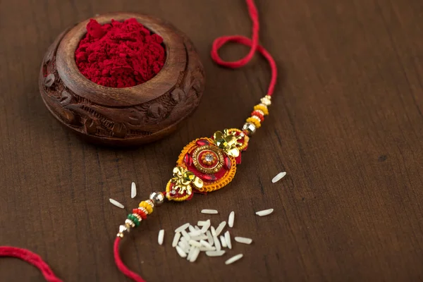 Indian Festival Raksha Bandhan Background Elegant Rakhi Rice Grains Kumkum — Stock Photo, Image